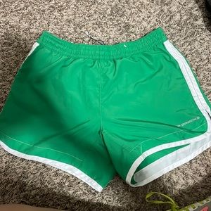 green athletic shorts